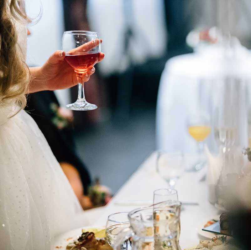 women-holding-a-wine-glass